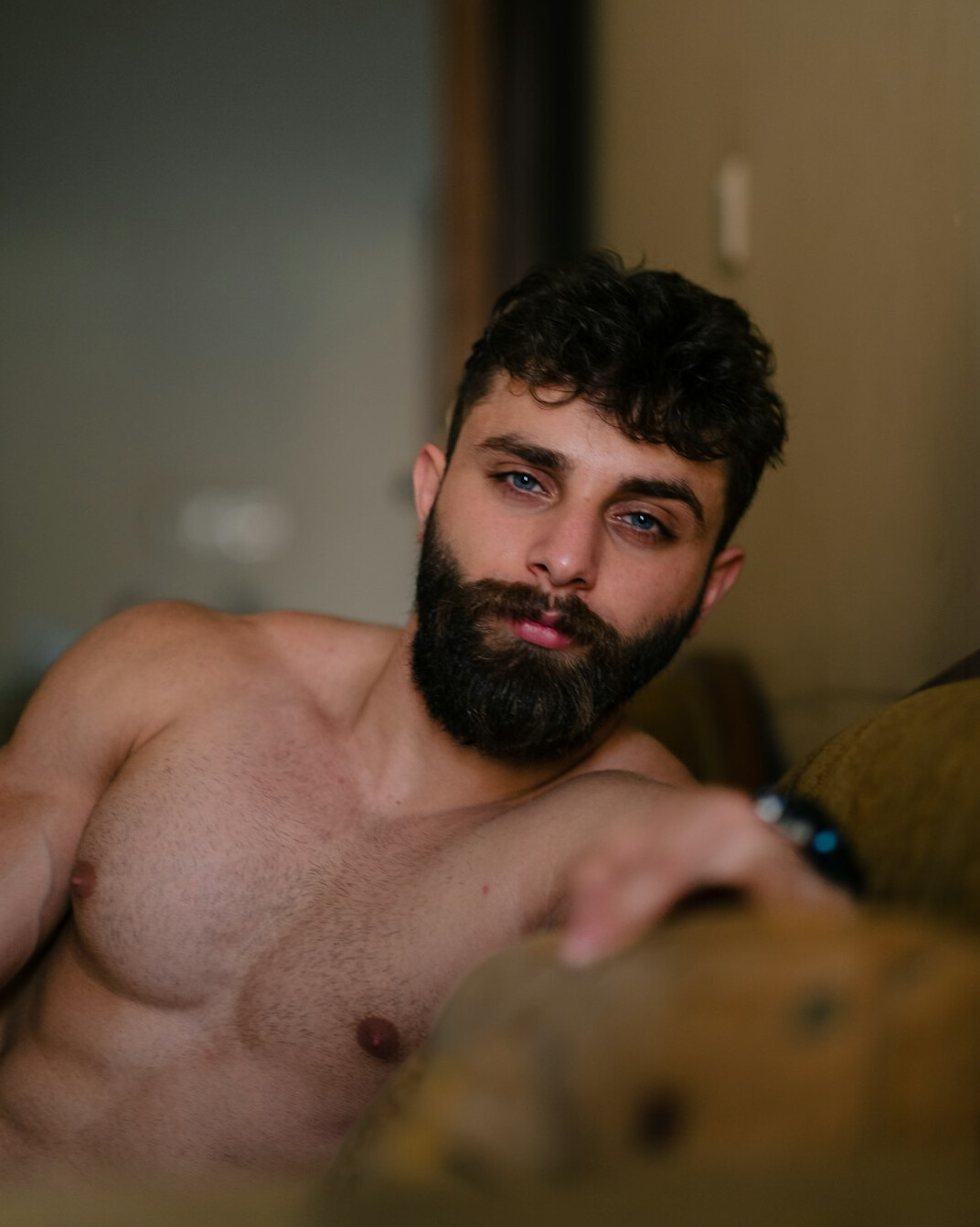 Portrait of a bearded man looking at the camera