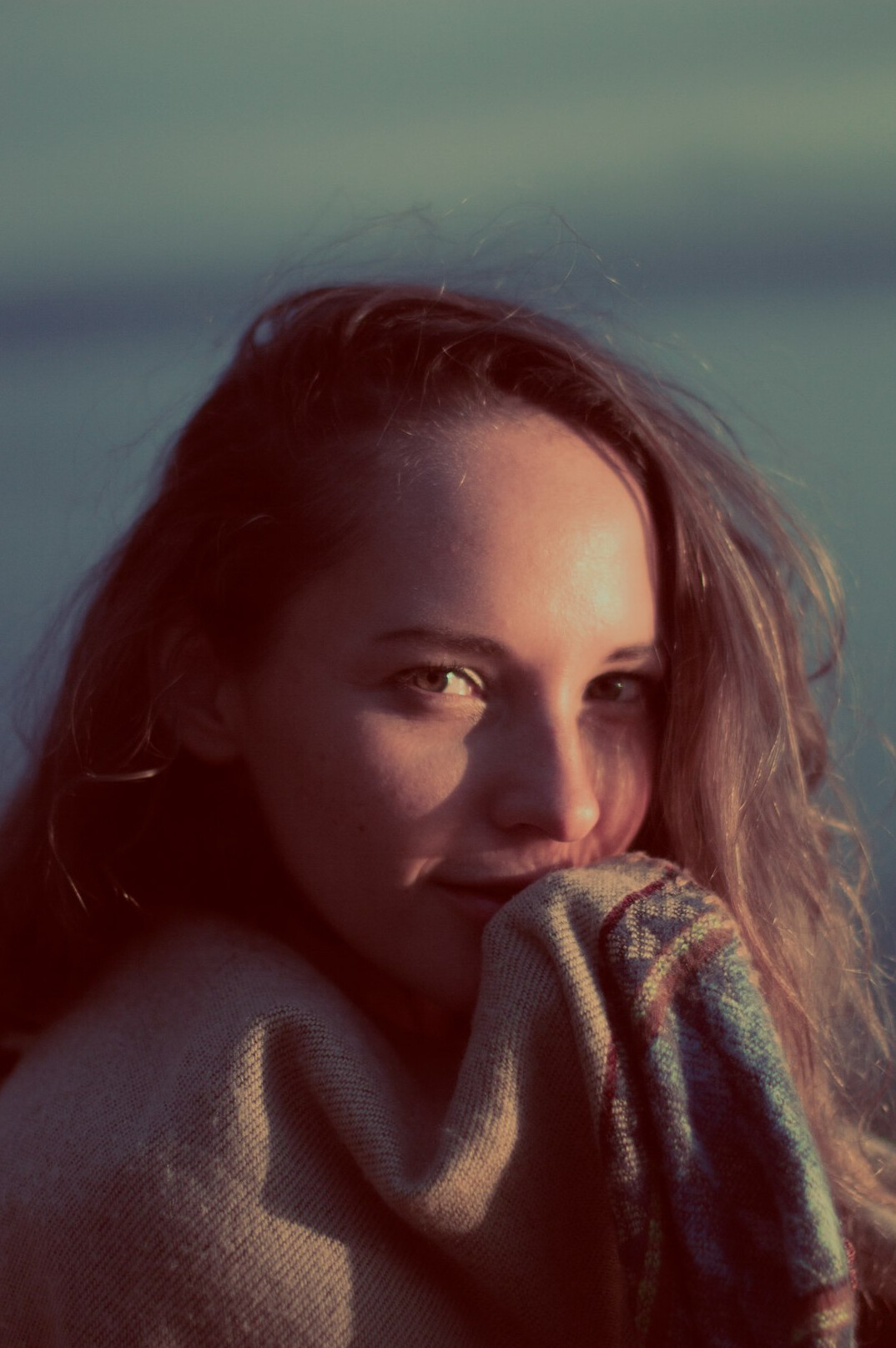 Portrait of a young woman with a warm smile