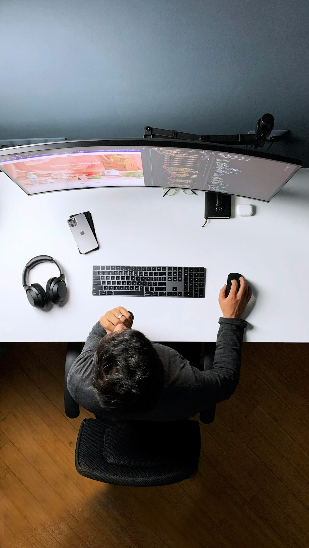 office worker stretching at desk
